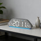 Dark gray LED desk alarm clock with blue edge light and digits