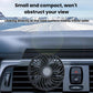 USB mini car fan sitting in car air vent with control panel beside it