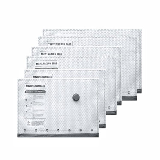 Clear vacuum compression bags set with round valve caps, stacked for household clothing storage