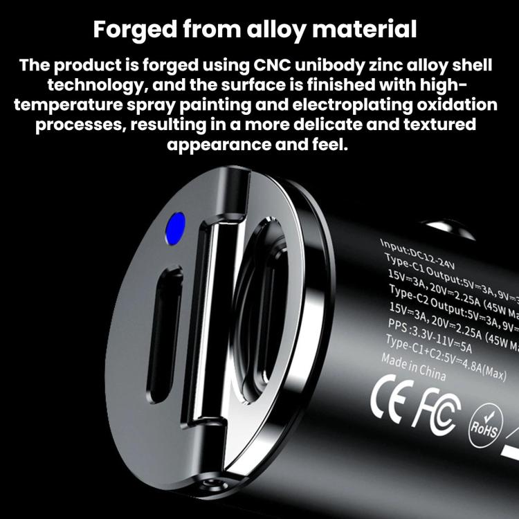 Black mini car fast charger with metallic alloy shell and dual front port openings.