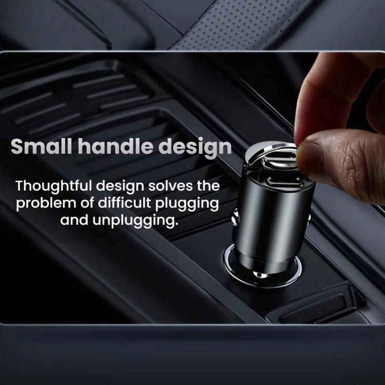 Black mini car fast charger being plugged in, pull-ring design on lighter port.