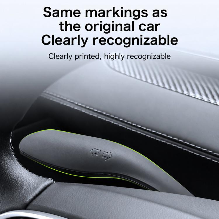 Steering column control cover in gray with neon green border, installed in car