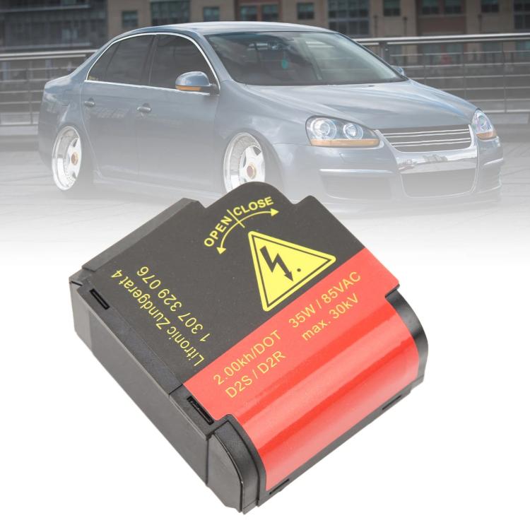 High-voltage headlight igniter module with black housing, red label, and warning icon