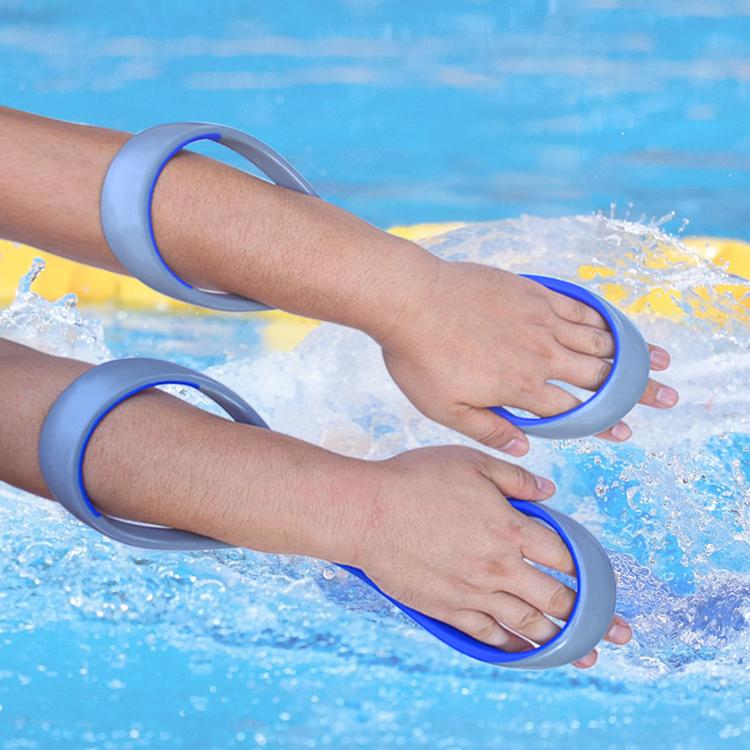 Blue figure-eight swimming arm corrector loops on forearms, hands relaxed