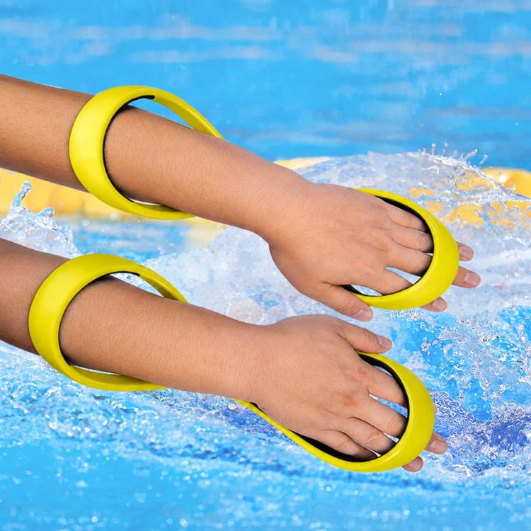 Yellow figure-eight swimming arm corrector loops on forearms in a pool