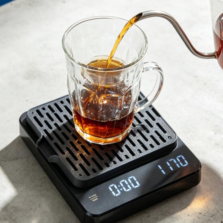 Black 3D-printed espresso scale drip tray with sloped perforated top and catch base