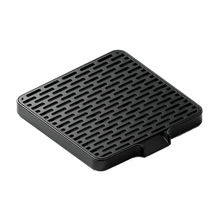 Black rectangular espresso drip tray with raised perforated grid top and side notch