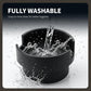 Black cup holder insert shown with water splashing into the open tray