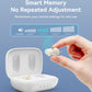 Hand placing light beige in-ear hearing aid into white charging case