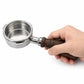 Walnut wood portafilter handle held by hand with stainless filter basket