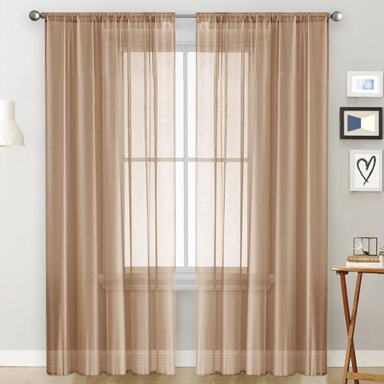 Single sheer light-filtering window curtain in light mocha with rod pocket header and grid panels