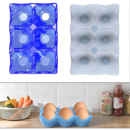 Silicone egg tray mold with 6 egg-cup cavities, blue and light gray.