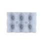 Light gray silicone egg tray mold with 6 egg-cup cavities, rectangular.