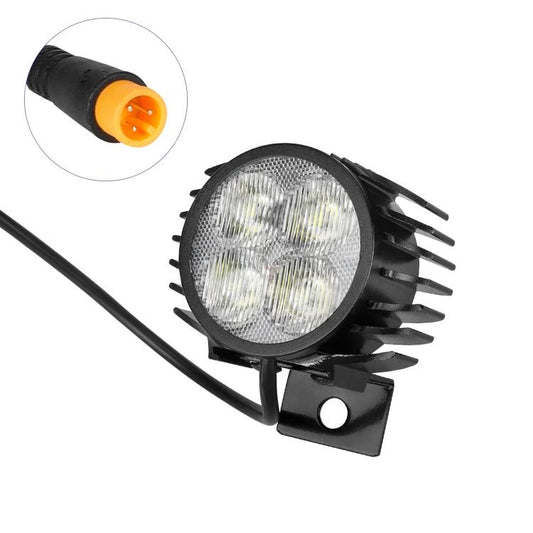 Electric scooter LED headlight lamp with round clear lens and black finned housing