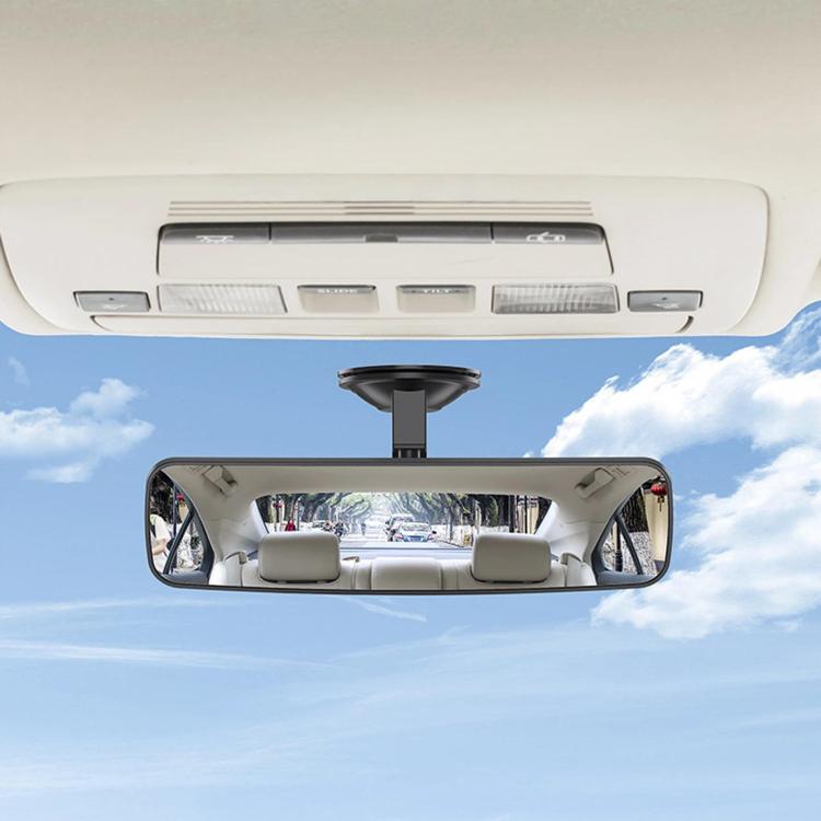 Wide-angle reversing mirror with black frame and overhead suction mount on a car