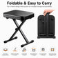 Folded black X-frame piano stool with padded seat for compact storage