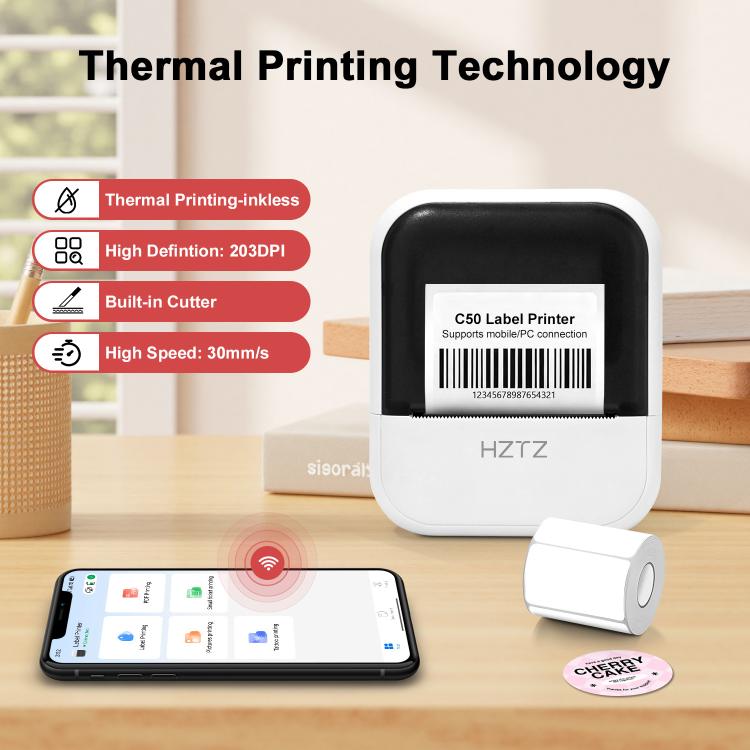White HZTZ C50 label printer on desk with roll of thermal labels