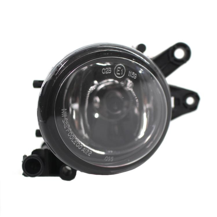 Round fog light assembly with clear lens and black mounting bracket