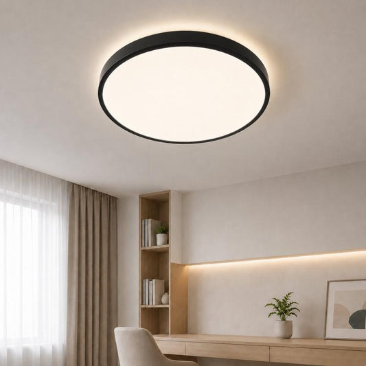Round LED flush mount ceiling light, black slim rim, illuminated on ceiling.