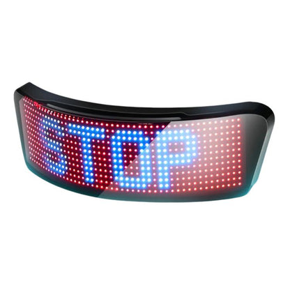 Black LED helmet display screen with multicolor dot-matrix message pattern