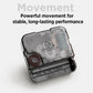 Clock quartz movement mechanism close-up with metal housing and label details