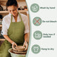 Green canvas work apron on model with care icons for hand wash and air-dry