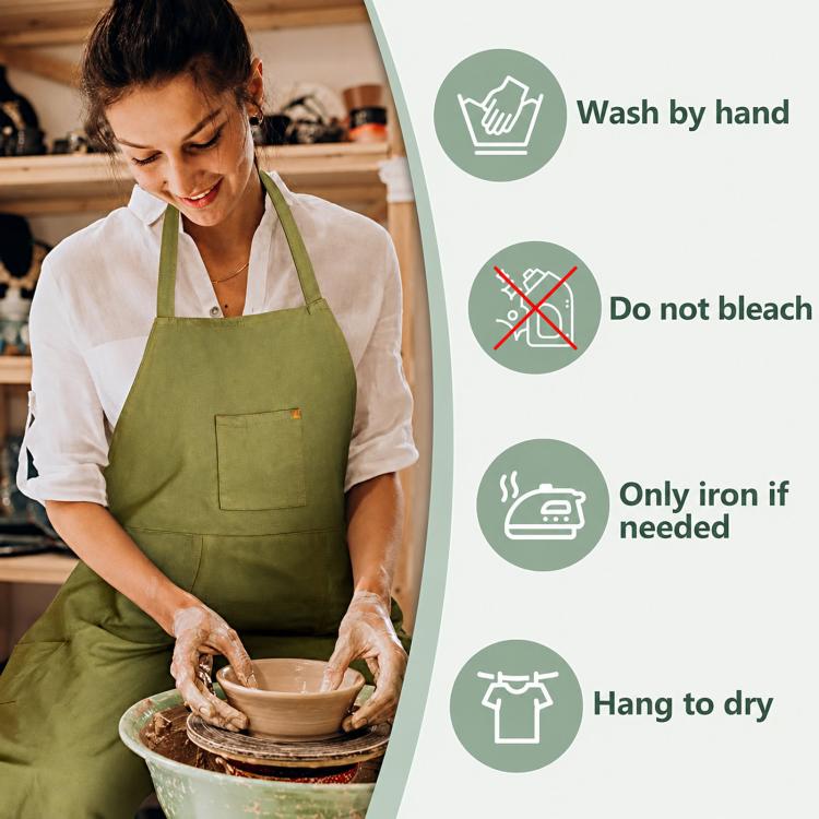 Green canvas work apron on model with care icons for hand wash and air-dry