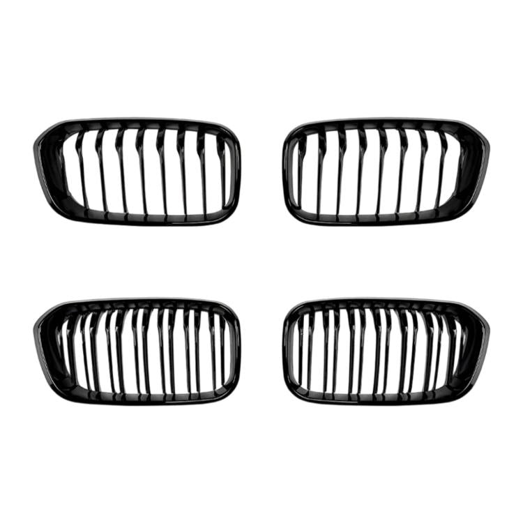 Set of four black oval front grilles with vertical slat bars
