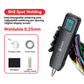 Black handheld spot welder with digital display screen, shown with charging cable, sandpaper, and spare needles