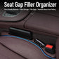 Black car seat gap organizer with red insert, placed between car seats