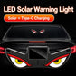 Solar car window warning light mounted on windshield, blinking eye panel with 3 suction cups