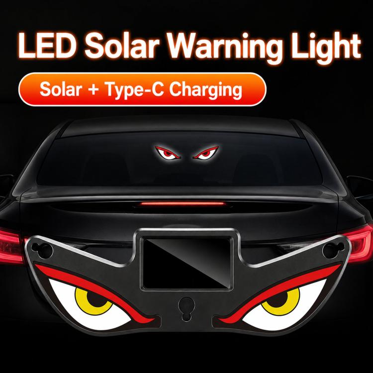 Solar car window warning light mounted on windshield, blinking eye panel with 3 suction cups