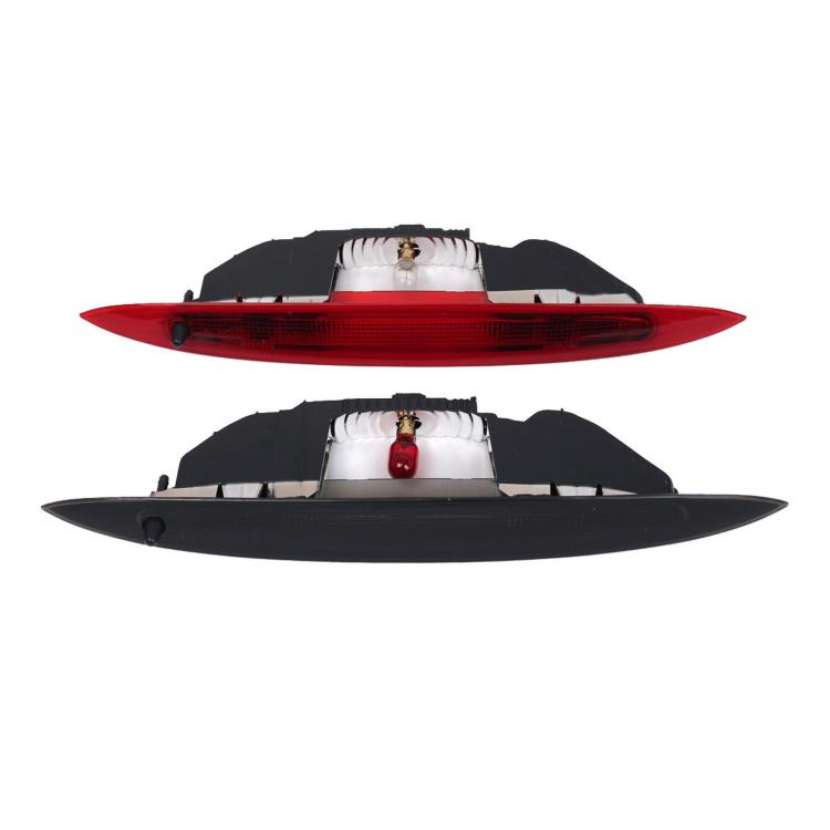 High-mount brake warning light with red lens and black housing, front views
