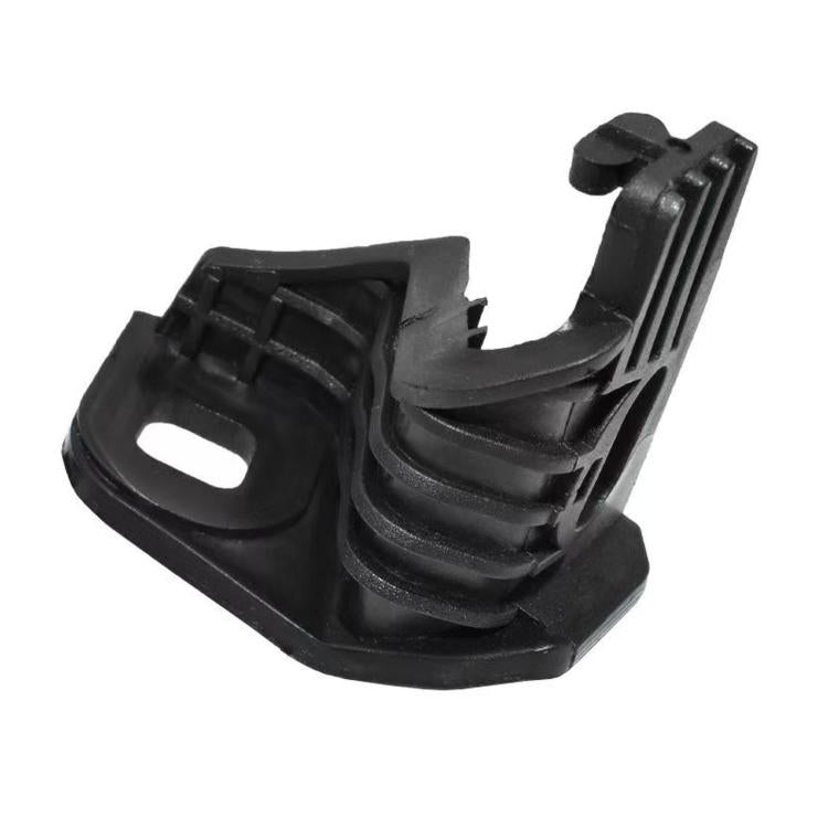 Front headlight bracket retainer clip, black plastic housing with ridged arm