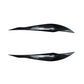 Carbon fiber headlight eyebrow decal pair with textured curved design for BMW 3 Series F30/F31