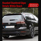 Rear roof spoiler on a station wagon, glossy black finish
