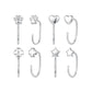 Assorted silver-tone charm hoop earrings: paw, heart, flower, clover, and stars