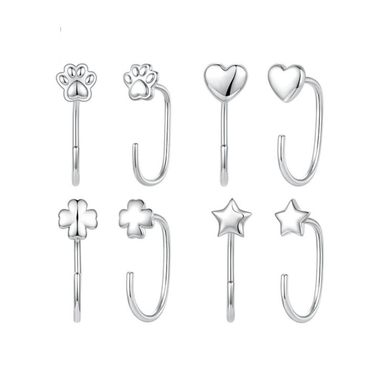 Assorted silver-tone charm hoop earrings: paw, heart, flower, clover, and stars