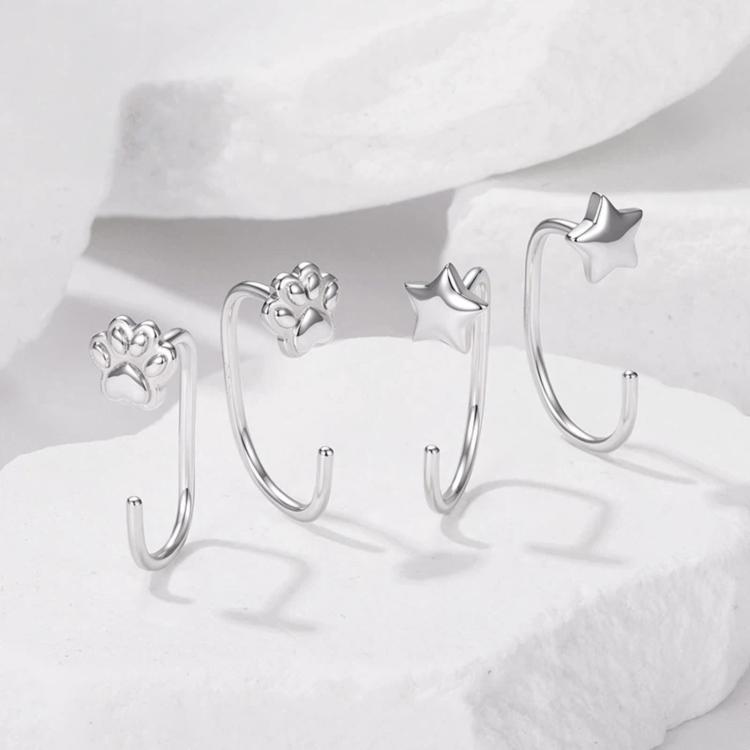 Silver-tone charm hoop earrings set with paw and star details