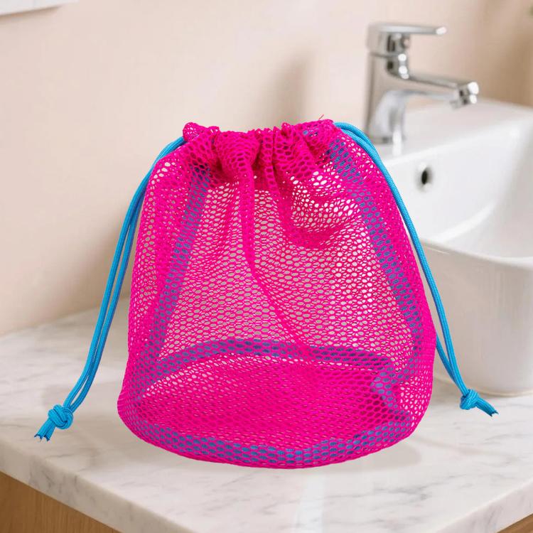 Fuchsia pink mesh drawstring bag with blue cords and tie pulls