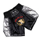 Black muay thai boxing shorts with silver side panels and Boxing Fight Club emblem