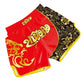 Red Muay Thai boxing shorts with black/gold floral panel and gold dragon design