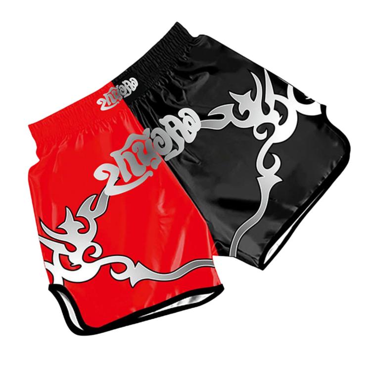 Muay Thai boxing shorts in red and black with ornate dragon and script print.
