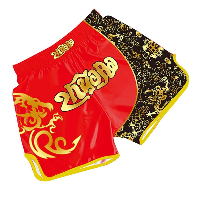 Muay Thai boxing shorts in red with black-gold pattern panel and dragon print.