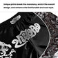 Black sanda fighting shorts with large white logo graphic and patterned side panel