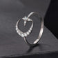 Sterling silver open ring with crescent star frame and bright center stone