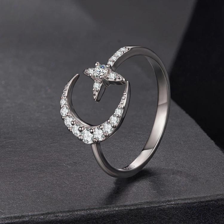 Sterling silver open ring with crescent star frame and bright center stone