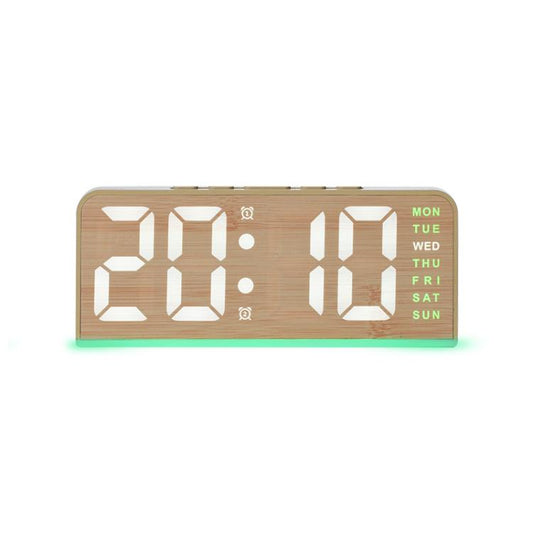 Digital alarm clock in light wood case with white time display and green bottom glow