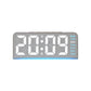Digital alarm clock with gray fabric oval case, white time digits and weekday list