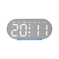 Digital alarm clock with gray fabric oval case, white digits and blue bottom ambient light